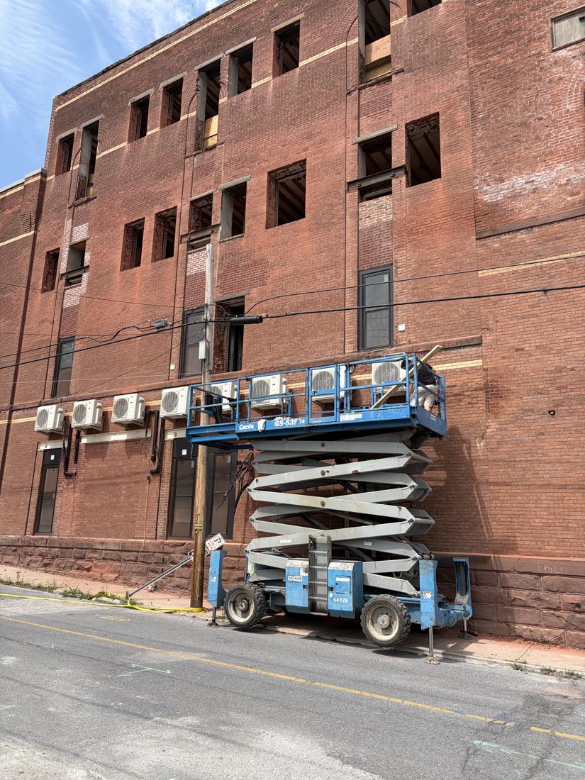 Commercial HVAC installation using lift equipment
